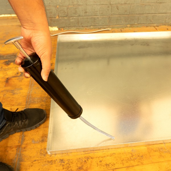 Drip Pan Fluid Evacuator