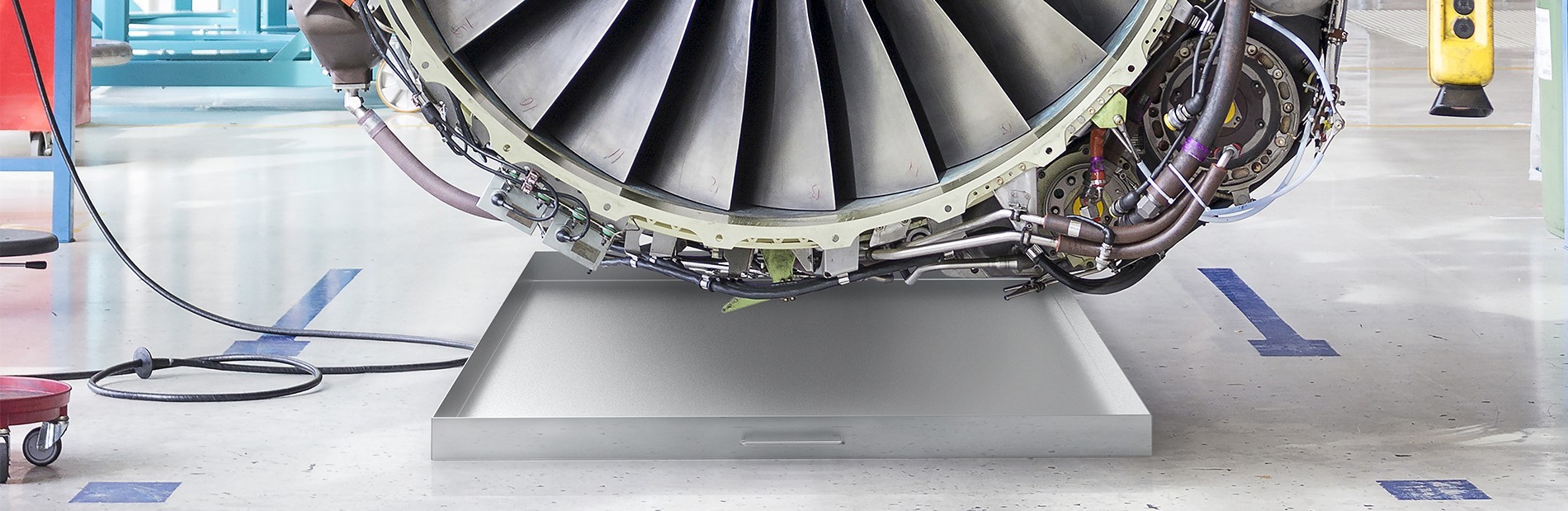 Aircraft Drip Pan Spill Containment